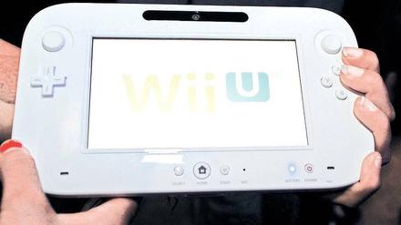 Mit dem großen Display sieht der Controller der „Wii U“ wie ein Tablet-PC aus. Mit der neuen Konsole kann mit und ohne Fernseher gespielt werden. Foto: AFP