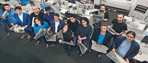 Exil-Journalisten beim Netzwerktreffen im Newsroom vom Tagesspiegel.