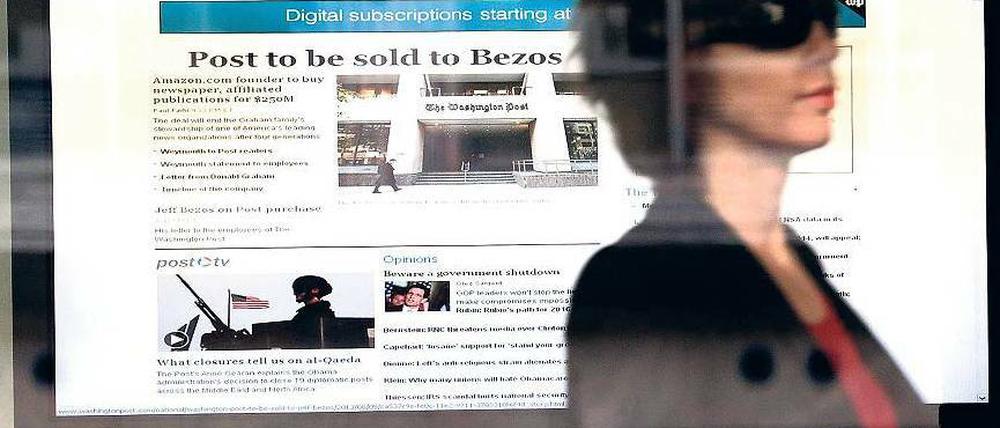 In eigener Sache berichtete die „Washington Post“ vor einem Jahr über den bevorstehenden Verkauf an Jeff Bezos. Der Amazon-Gründer pumpte frisches Geld in die US-Hauptstadtzeitung und schuf damit 50 neue Stellen. Foto: AFP