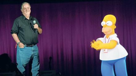 Sieh’s mal gelb. Matt Groening scherzt mit Homer Jay Simpson, der durch Ignoranz, Faulheit und Egoismus auffällt, aber auch wenige geniale Momente hat. 