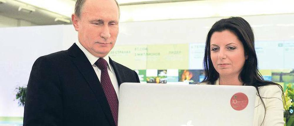 Russlands Interessen im Blick. Präsident Wladimir Putin und RT-Chefin Margarita Simonyan.
