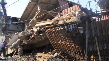 Das Beben zerstörte in Imphal viele Häuser.