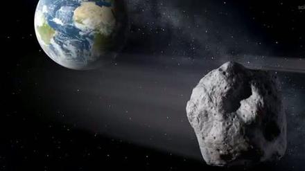 Die künstlerische Darstellung zeigt einen erdnahen Asteroiden im Vorbeiflug. 