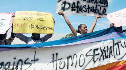 Vereint in der Ablehnung. Das Anti-Homosexuellen-Gesetz in Uganda ist sehr populär. Viele Ugander – wie diese Demonstranten in Kampala – halten Homosexualität für einen westlichen Sittenverfall, der nichts mit afrikanischen Werten zu tun hat. 