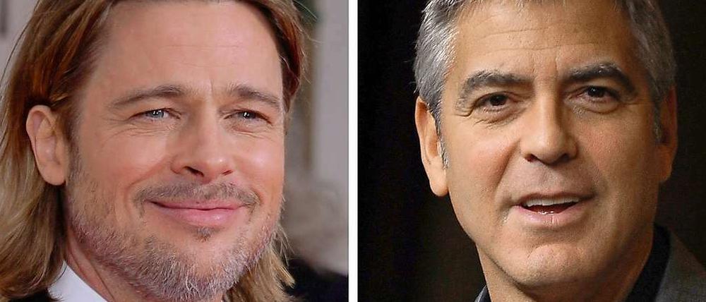 Die Schauspieler Brad Pitt (l) und George Clooney stehen bald gemeinsam auf der Theaterbühne.