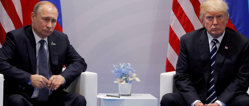 Trump und Putin bei ihrem ersten offiziellen Treffen als Präsidenten in Hamburg.
