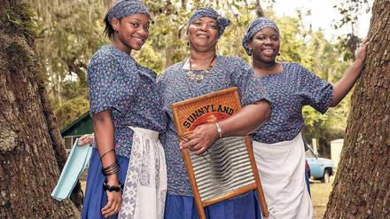 Gut drauf. Diese drei Gullah-Folksängerinnen warten auf ihren Auftritt beim Kulturfestival auf Sapelo Island. 