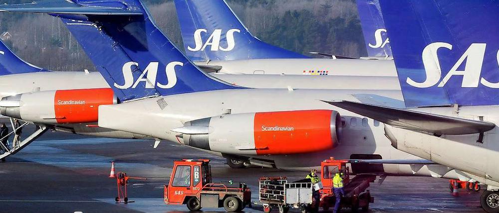 Drohende Insolvenz. Flugzeuge der skandinavischen Fluggesellschaft SAS 2009 auf dem Flughafen Arlanda bei Stockholm