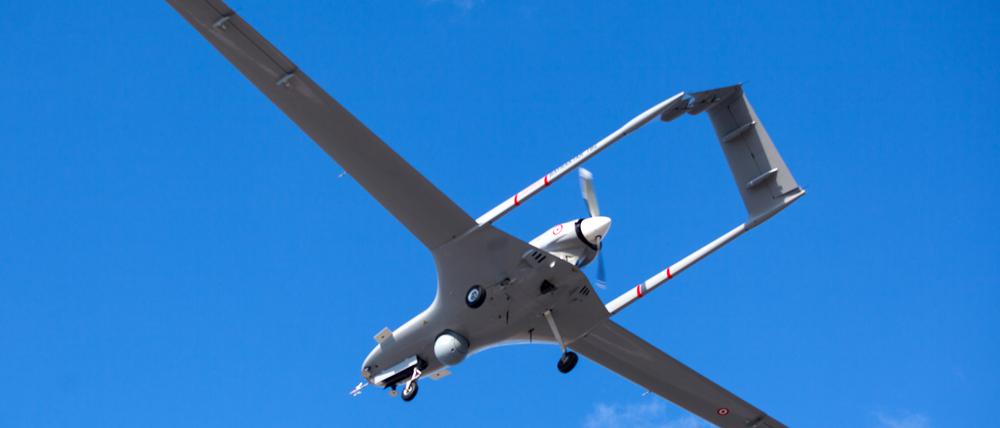 The Bayraktar TB2 drone is pictured flying on December 16, 2019 at Gecitkale Airport in Famagusta in the self-proclaimed Turkish Republic of Northern Cyprus (TRNC). - The Turkish military drone was delivered to northern Cyprus today amid growing tensions over Turkey's deal with Libya that extended its claims to the gas-rich eastern Mediterranean. The Bayraktar TB2 drone landed in Gecitkale Airport in Famagusta around 0700 GMT, an AFP correspondent said, after the breakaway northern Cyprus government approved the use of the airport for unmanned aerial vehicles. It followed a deal signed last month between Libya and Turkey that could prove crucial in the scramble for recently discovered gas reserves in the eastern Mediterranean. (Photo by Birol BEBEK / AFP)