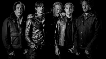 Josh Homme (Mitte) und seine Mitstreiter Troy Van Leeuwen, Jon Theodore und Michael Shuman.