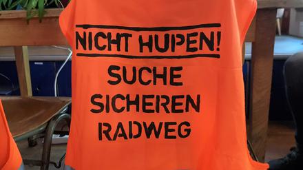 Protest auf der Warnweste bei „Changing Cities“.