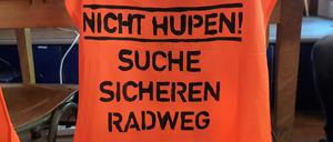 Protest auf der Warnweste bei „Changing Cities“.