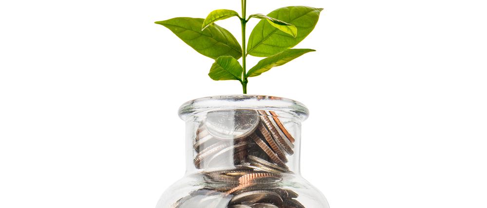coins in jar with empty space for text