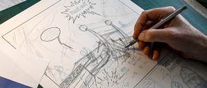 Zeichner Andreas Schulze („Mosaik“) bei der Arbeit.