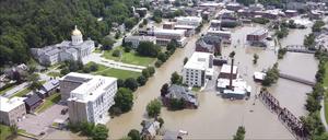 Dieses Bild aus Drohnenaufnahmen, die von der Vermont Agency of Agriculture, Food and Markets zur Verfügung gestellt wurden, zeigt Überschwemmungen in Montpelier. 