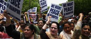 Mitglieder des All India Mahila (AIMC) Congress rufen Slogans während eines Protestes gegen sexuelle Gewalt gegen Frauen und für Frieden in der anhaltenden ethnischen Gewalt im nordöstlichen indischen Bundesstaat Manipur (Symbolbild).