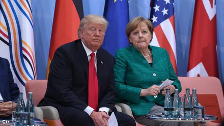 Donald Trump und Angela Merkel.