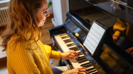 Ob Pianistin oder Streichquartett: Immer mehr Musiker spielen von Tablets statt von Papiernoten.
