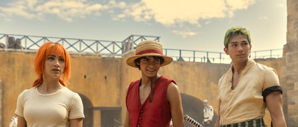One Piece. (L to R) Emily Rudd as Nami, Iñaki Godoy as Monkey D. Luffy, Mackenyu Arata as Roronoa Zoro in season 1 of One Piece. Cr. Casey Crafford/Netflix © 2023