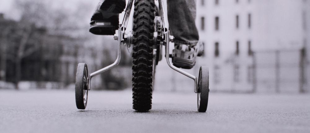 Stützräder geben Kindern Sicherheit beim Radfahren.