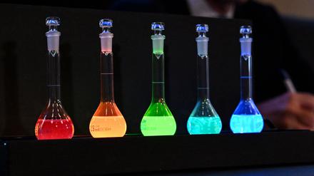 Laboratory flasks are used for explanation during the announcement of the winners of the 2023 Nobel Prize in chemistry at Royal Swedish Academy of Sciences in Stockholm on October 4, 2023.