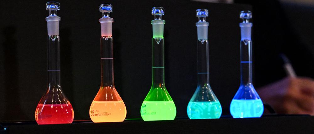 Laboratory flasks are used for explanation during the announcement of the winners of the 2023 Nobel Prize in chemistry at Royal Swedish Academy of Sciences in Stockholm on October 4, 2023.