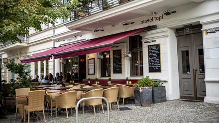 Das israelische Restaurant Masel Topf in Berlin Prenzlauer Berg. Die Terrorgruppe Hamas ruft weltweit zu Aktionen gegen jüdische Einrichtungen auf. Besitzern israelischer Restaurants in Berlin macht das teilweise Angst.