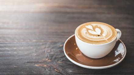 Soft focus on latte coffee cup - vintage effect process pictures