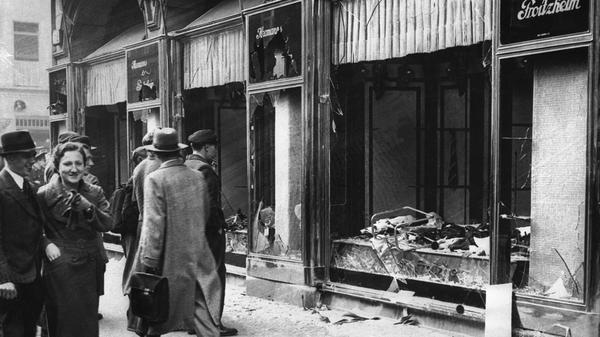 (Original Caption) 11/17/38-Berlin: A street scene in Berlin, showing the shattered fronts of Jewish-owned stores, the result of anti-Jewish demonstrations following the slaying of Ernst vom Rath in Germany's Paris embassy. Vom Rath's slayer was a Jewish youth.