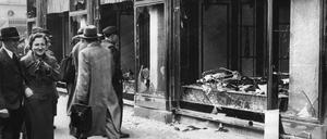 (Original Caption) 11/17/38-Berlin: A street scene in Berlin, showing the shattered fronts of Jewish-owned stores, the result of anti-Jewish demonstrations following the slaying of Ernst vom Rath in Germany's Paris embassy. Vom Rath's slayer was a Jewish youth.