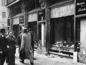 (Original Caption) 11/17/38-Berlin: A street scene in Berlin, showing the shattered fronts of Jewish-owned stores, the result of anti-Jewish demonstrations following the slaying of Ernst vom Rath in Germany's Paris embassy. Vom Rath's slayer was a Jewish youth.