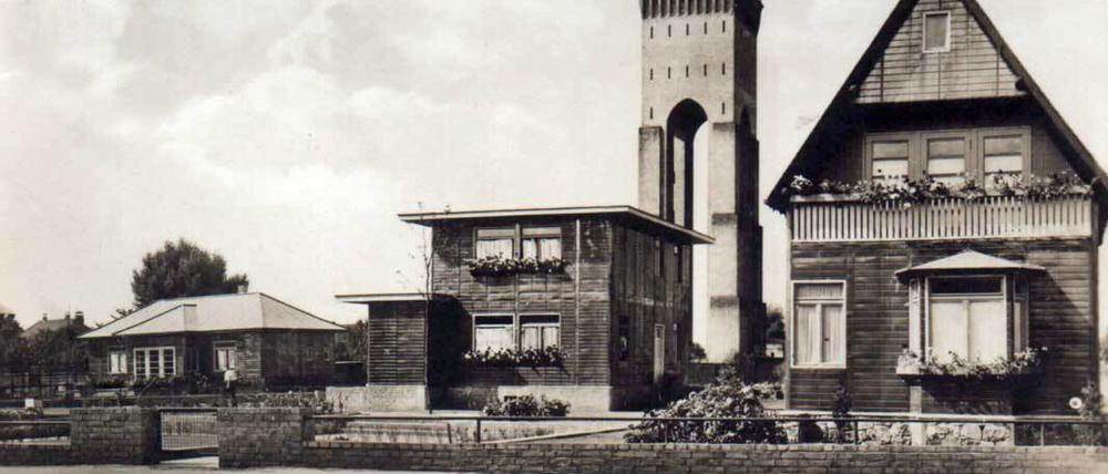 Historische Postkarte mit Kupferhäusern auf dem Gelände des Finow-Messingwerkes in den 1930er-Jahren.