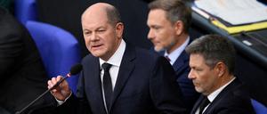 Die Ampelspitzen unter Druck: Christian Lindner, Robert Habeck und Olaf Scholz im Bundestag.