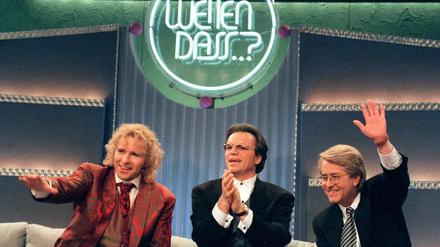 „Wetten, dass...?“ wurde anfangs von Frank Elstner (rechts), später Thomas Gottschalk und zwischenzeitlich auch von Wolfgang Lippert (Mitte) moderiert.