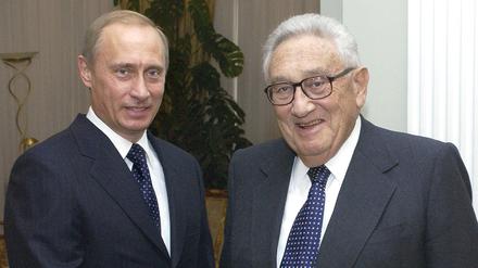 Putin und Kissinger im März 2004.