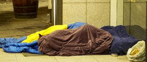 Obdachlose trotzen der Kälte.