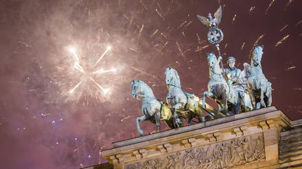 Damals wie heute ein Mittelpunkt der Feierlichkeiten: das Brandenburger Tor.