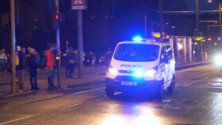 Police  Car  on  duty  in  the  city  of  Edinburgh  -  EDINBURGH,  UNITED  KINGDOM  -  JANUARY  10,  2020 xkwx edinburgh,  scotland,  city,  cityscape,  castle,  uk,  skyline,  architecture,  tourism,  europe,  landmark,  urban,  monument,  sky,  tower,  famous,  edinburgh  castle,  horizontal,  place  of  interest,  capital,  old,  street,  building  exterior,  built  structure,  dusk,  scottish,  travel  destinations,  ancient,  attraction,  popular,  horizon,  national  landmark,  travel,  outside,  history,  daytime,  outdoor,  landscape,  great  britain,  scots