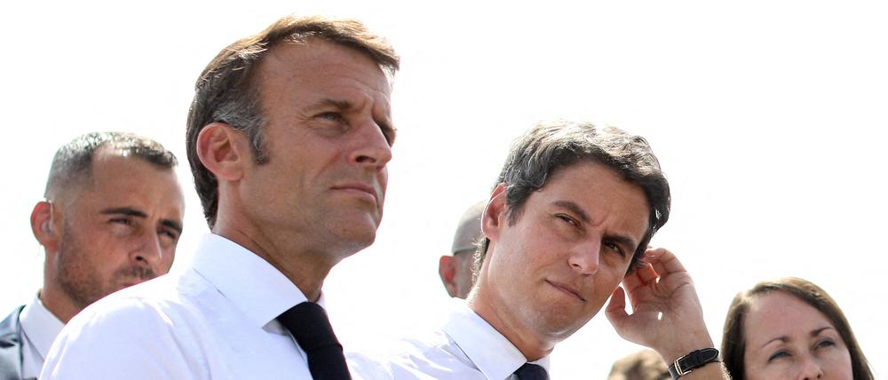 Attal (re.) und Macron ähneln sich nicht nur äußerlich.