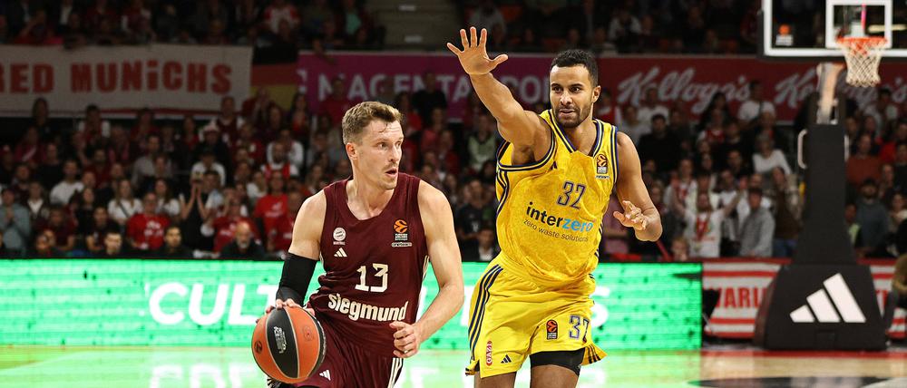 Weltmeister unter sich. Andreas Obst (links) liegt mit Bayern Mündchen momentan leicht vor Alba Berlin und Johannes Thiemann.