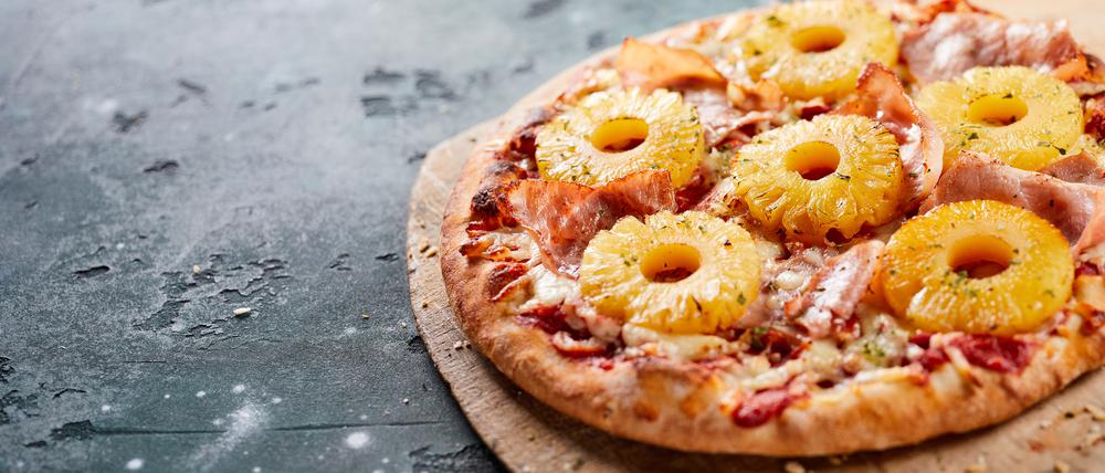 Im Ausland geboren, aber inzwischen auch keine Fremde mehr in Italien: Pizza mit Ananas oder „Pizza Hawaii“.