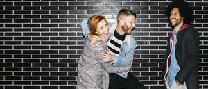 Zwei Männer, eine Frau