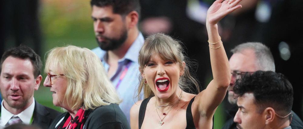 Feb 11, 2024; Paradise, Nevada, USA; Recording artist Taylor Swift enters the field as Kansas City Chiefs wins over the San Francisco 49ers in overtime of Super Bowl LVIII at Allegiant Stadium. Mandatory Credit: Joe Camporeale-USA TODAY Sports