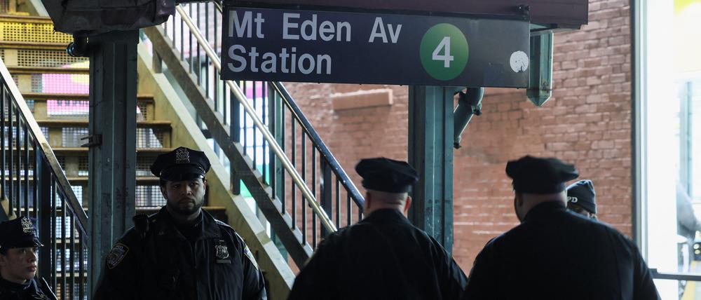 Members of the New York Police Department (NYPD) investigate the scene