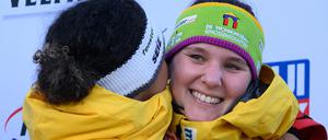 Lisa Buckwitz (r) und Vanessa Mark aus Deutschland jubeln nach dem Gewinn der Bobweltmeisterschaft.