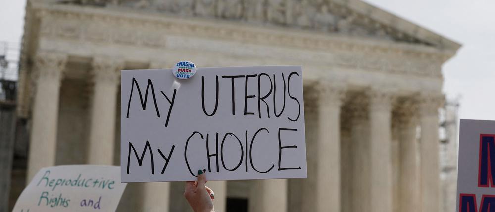Demonstrators participate in an abortion-rights rally outside the Supreme Court