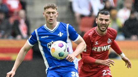 Die Kölner um Sargis Adamyan (r.) liefen Clemens Riedels Darmstädterin viel zu häufig hinterher.