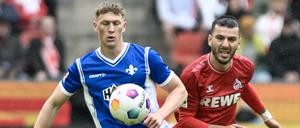 Die Kölner um Sargis Adamyan (r.) liefen Clemens Riedels Darmstädterin viel zu häufig hinterher.
