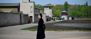 Visitors are seen at the former Sachsen-hausen Nazi concentration camp on April 23, 2024 in Oranienburg near Berlin, northeastern Germany. The site of what is now the Sachsenhausen memorial centre was one of the biggest concentration camps on German territory from 1936 to 1945. (Photo by Tobias SCHWARZ / AFP)