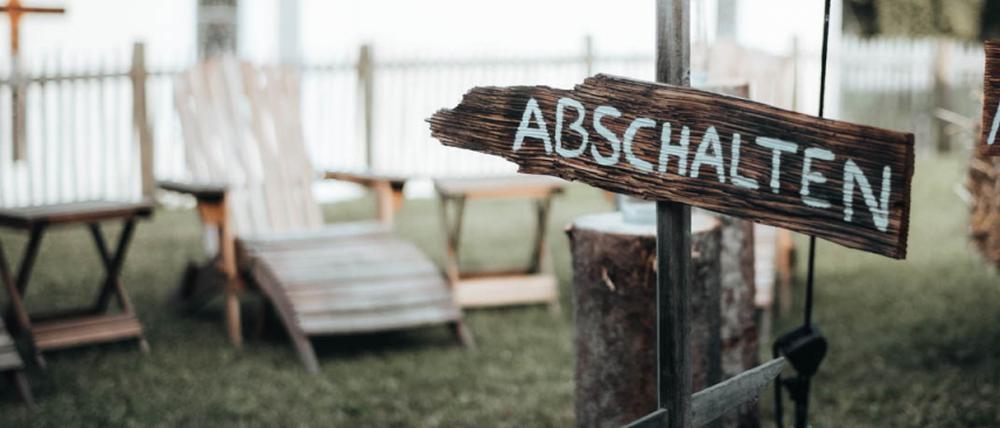 „Ausschalten“-Schild beim Handy-Detox-Seminar.